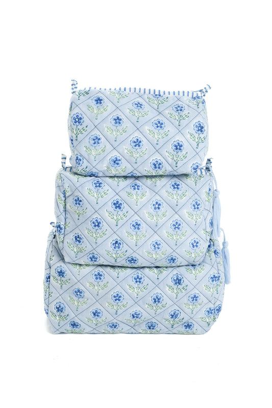 Blue blockprint makeup bag with quilted diamond pattern and drawstring tassel