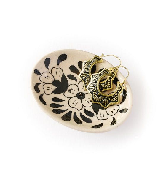 Ceramic soap dish with black floral design and gold loop hardware