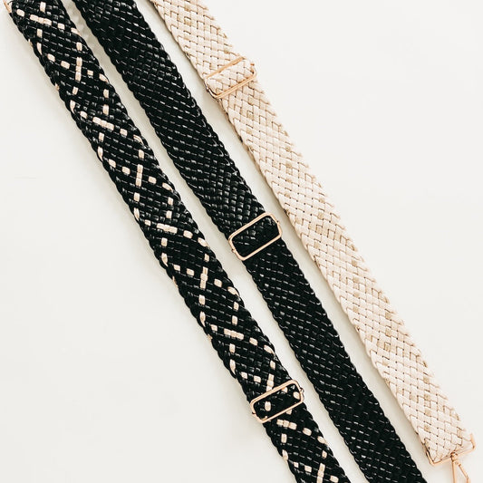 Braided dark strap with gold-tone buckles, adjustable length
