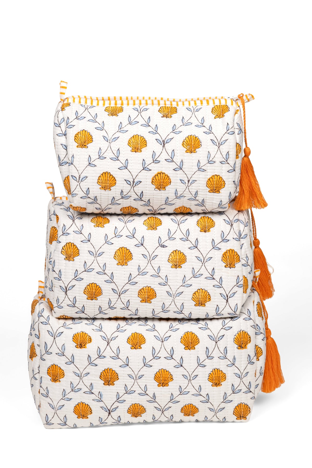 Tall blockprint makeup bag and pouch set, white with orange floral circles, tassels