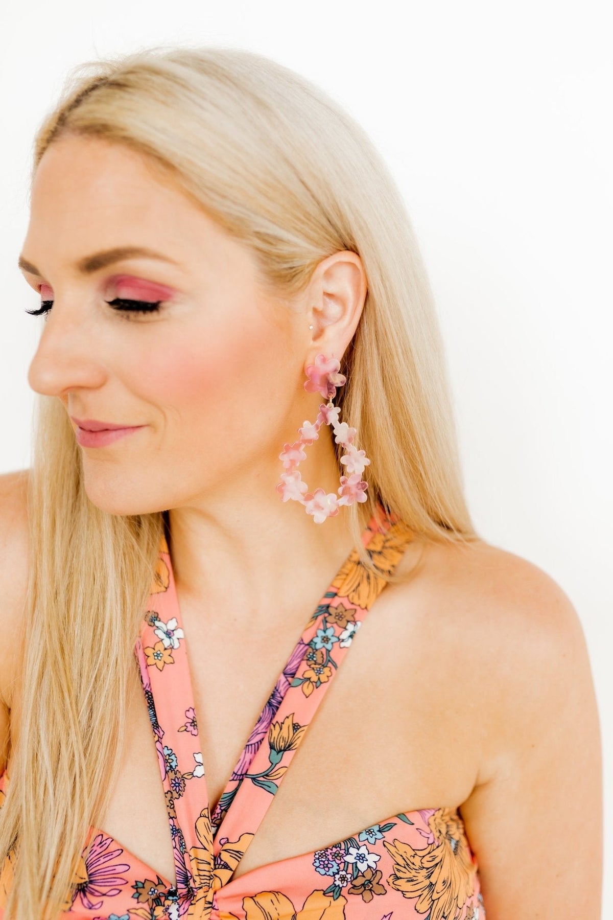 Pink floral statement earrings with dangling flower charms