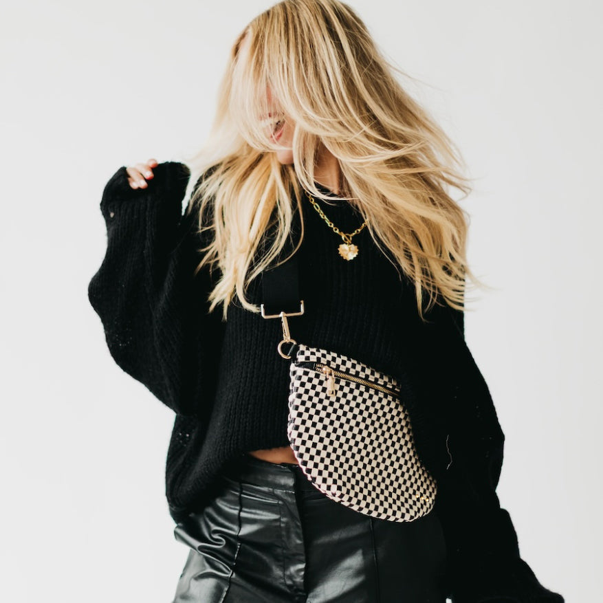 Westlyn woven bum bag, black-and-cream checkered with gold zipper and crossbody strap