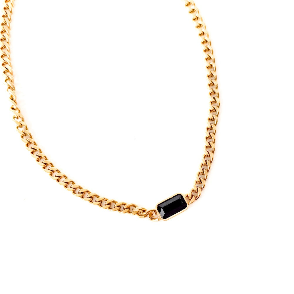 Gold link chain necklace with black rectangular pendant