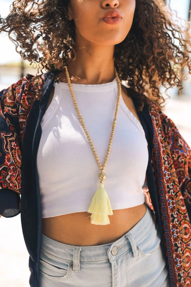 Bohemian beaded tassel necklace with gold chain and ivory tassel pendant