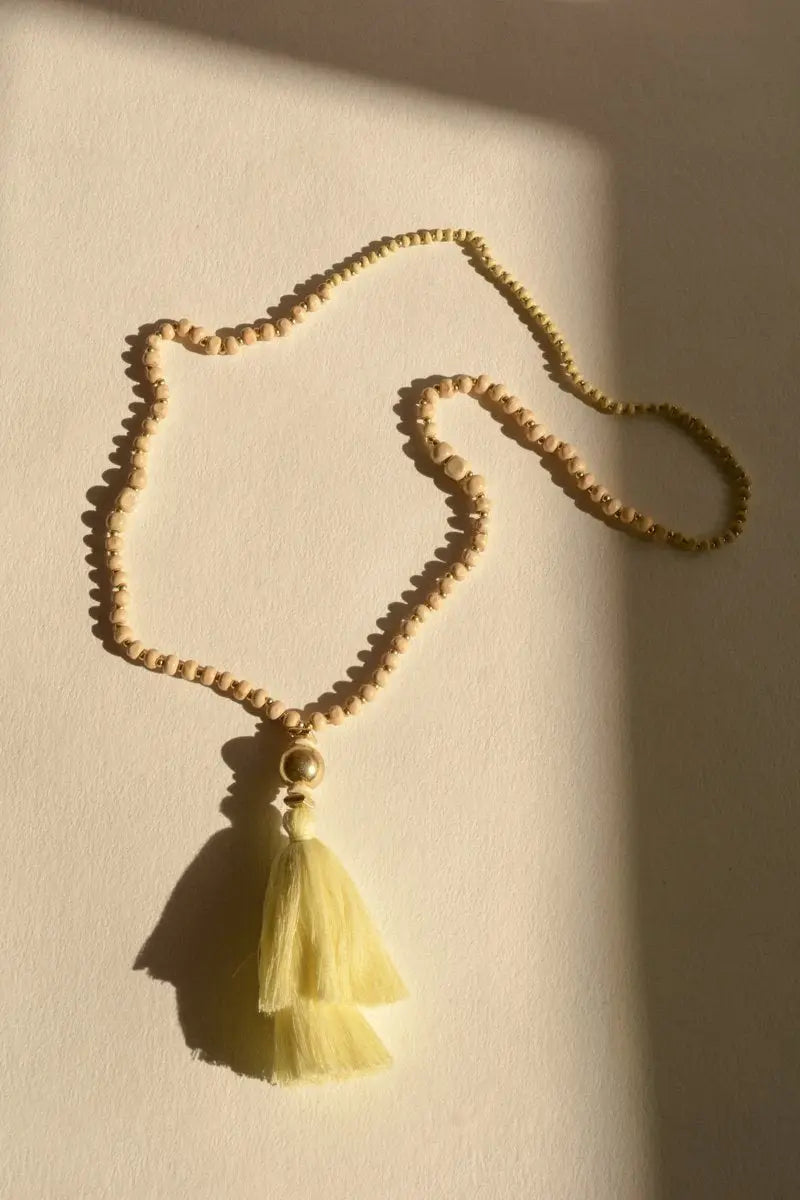 Bohemian beaded tassel necklace, gold beaded pendant with ivory tassel