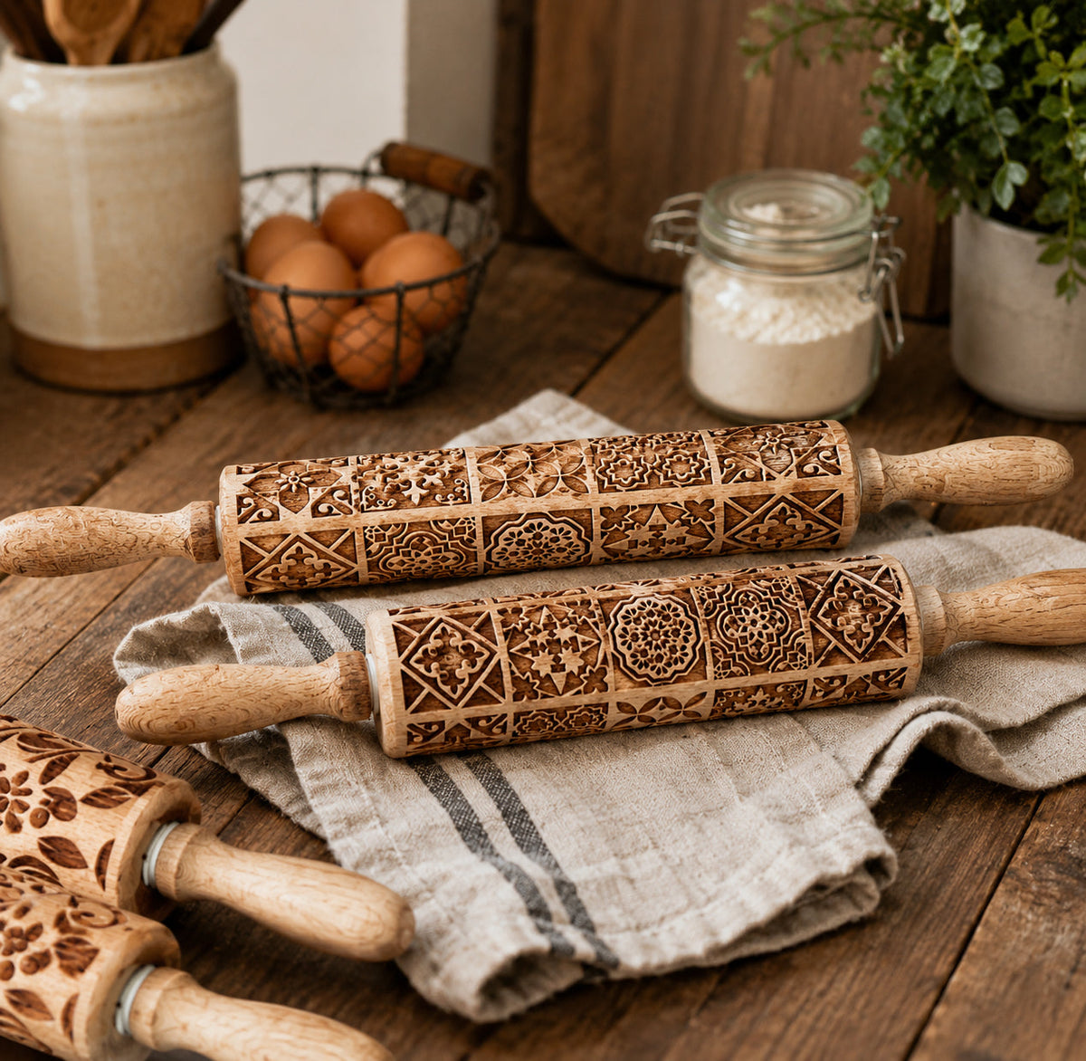 Wooden rolling pin set with box-like geometric and floral brown designs