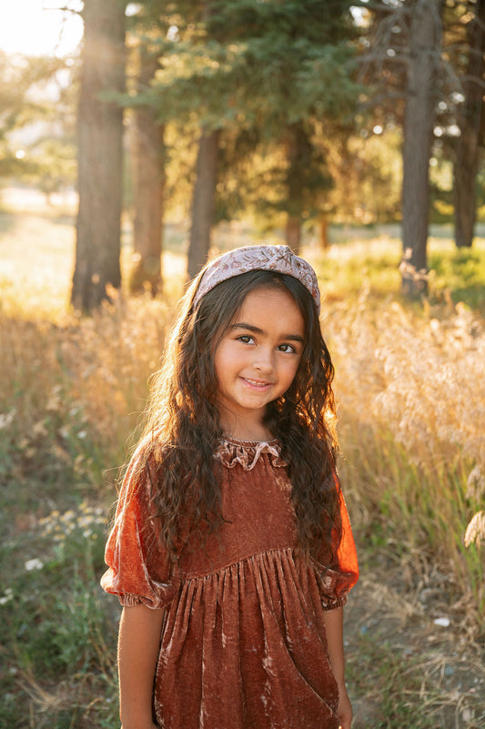 Child-worn floral knotted headband, beige with brown rust flower print