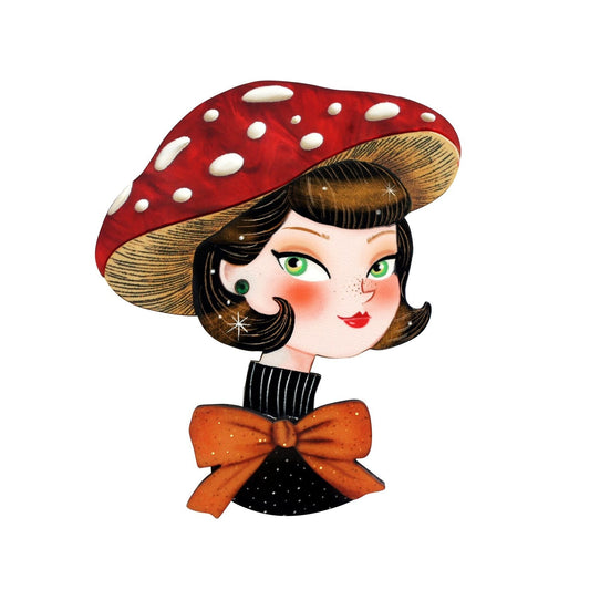 Girl wearing red polka-dot mushroom hat and orange bow brooch with illustrated face