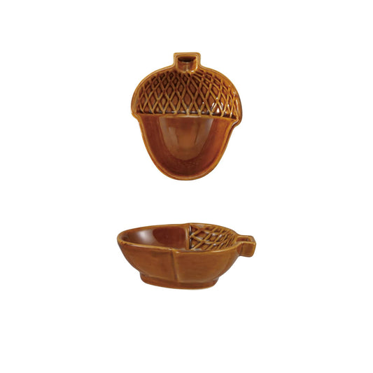 Brown acorn-shaped stoneware dish with textured cap and glossy interior