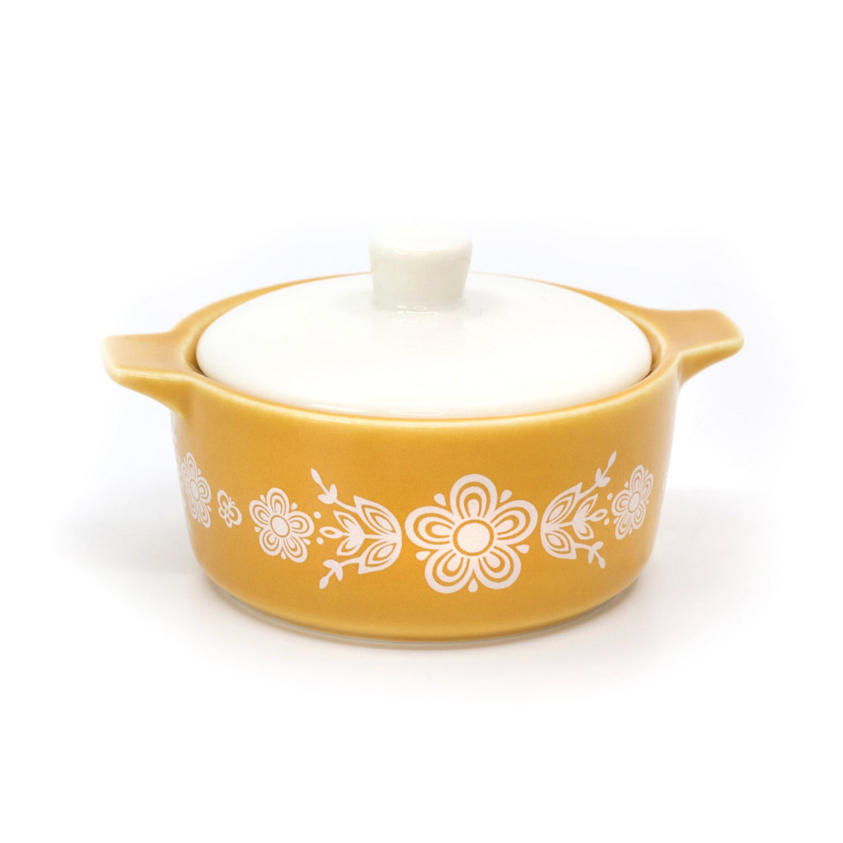 Yellow ceramic casserole trinket box with white lid and centered white floral design