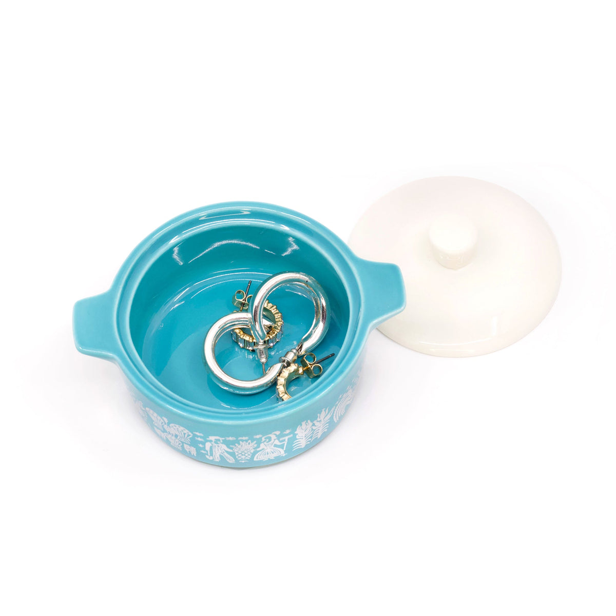 Blue ceramic trinket box with lid removed, showing hinged clasp inside
