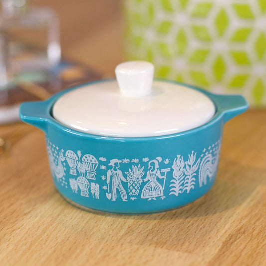 Blue ceramic casserole trinket box with white lid and white decorative pattern