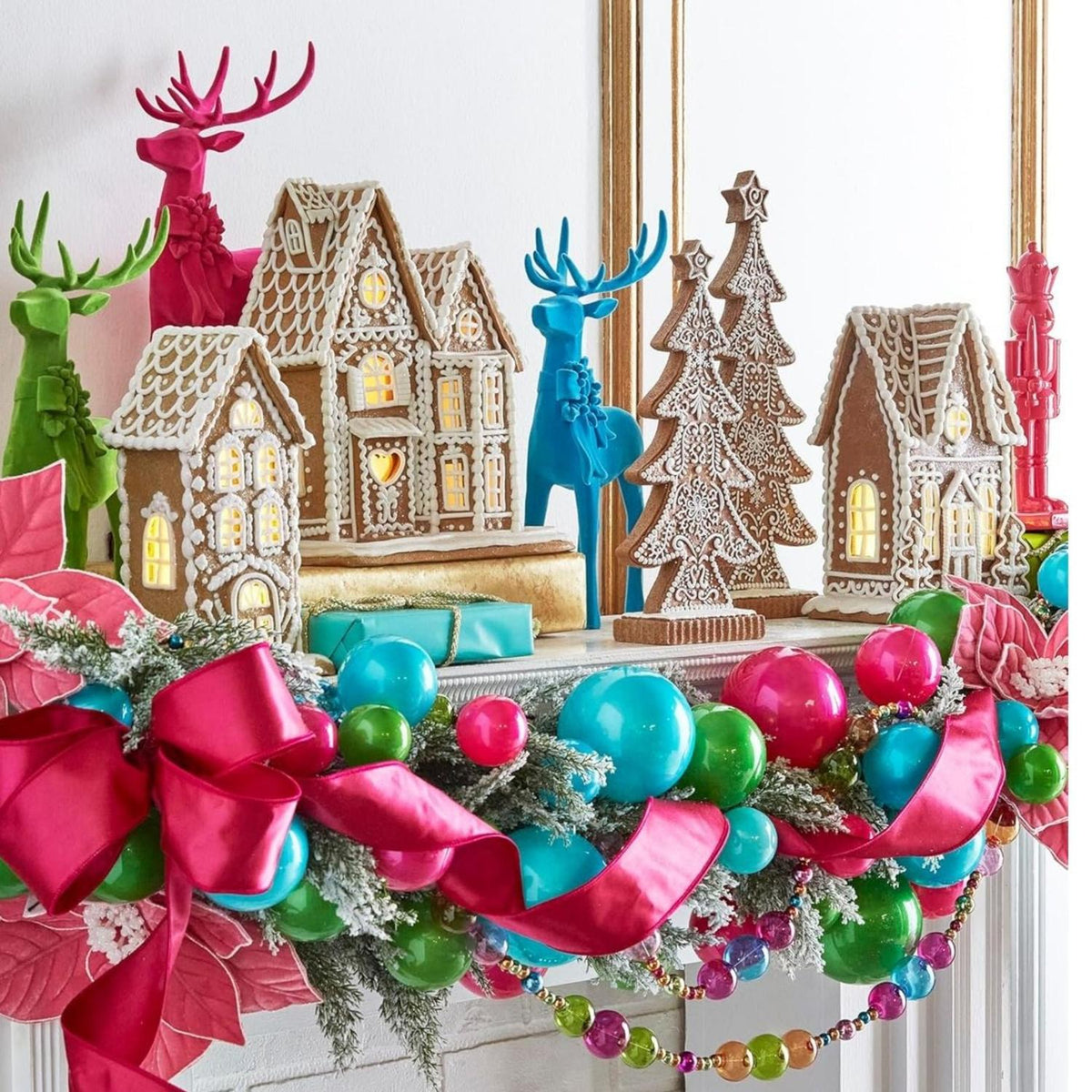 Set of lighted gingerbread house decorations with bright multicolor ornaments