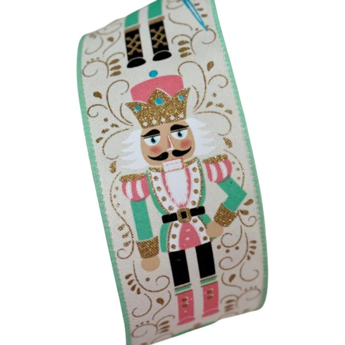 Close-up of nutcracker motif on ivory and mint green ribbon with decorative details