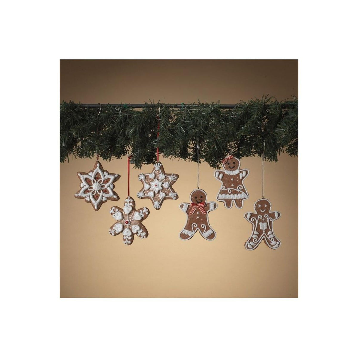 4-inch gingerbread and snowflake clay dough ornaments shown hanging together