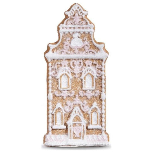Tall church ornament with white frosting, brown trim, and glittery facade details