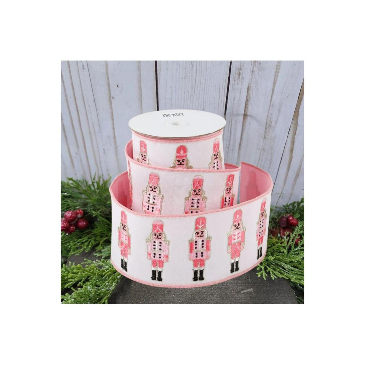 Nutcracker dupion ribbon on spool, pink-and-white with repeating nutcracker figures