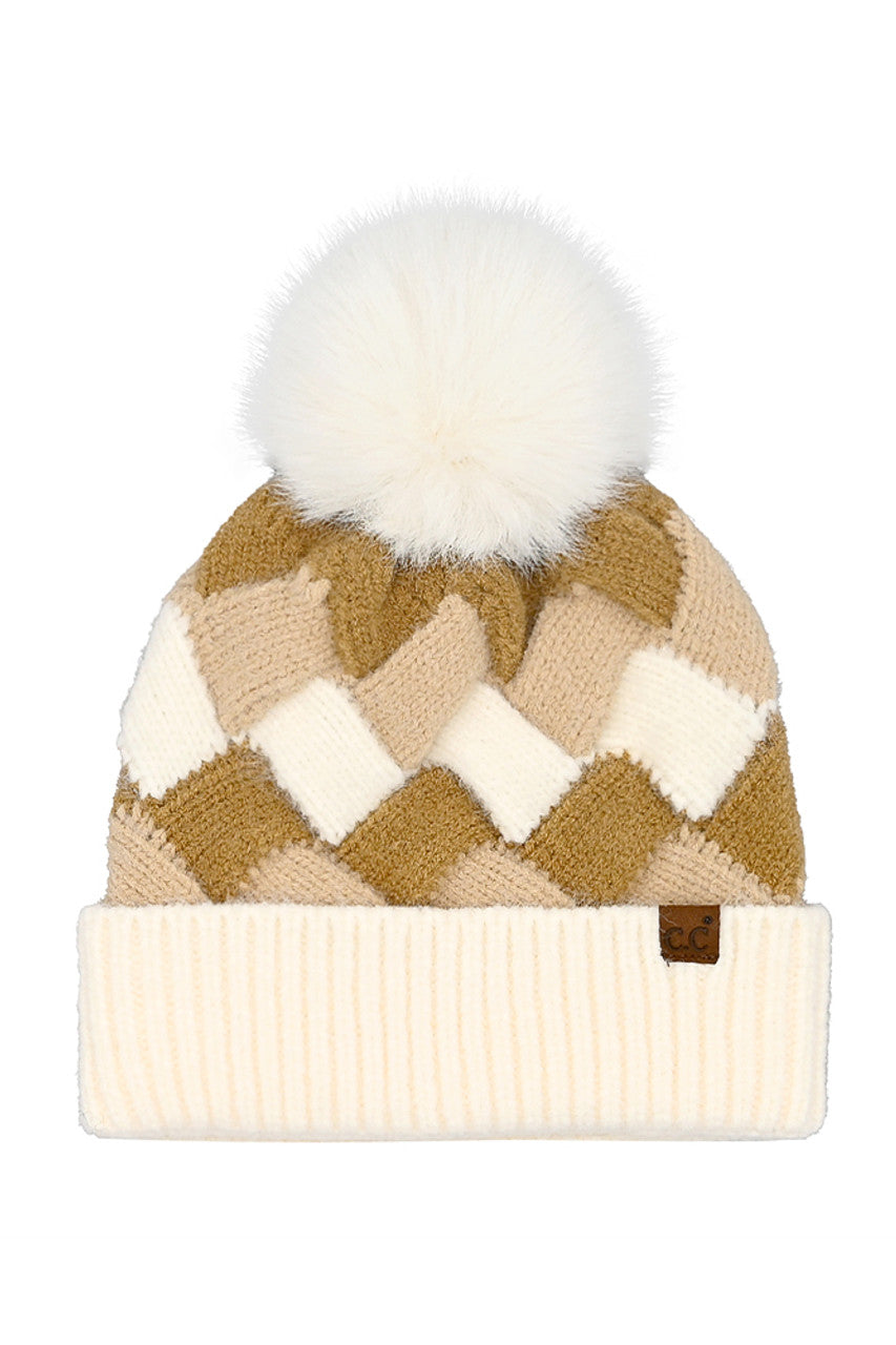 Beige chunky knit beanie with white pom pom, diamond pattern, ribbed cuff, C.C patch
