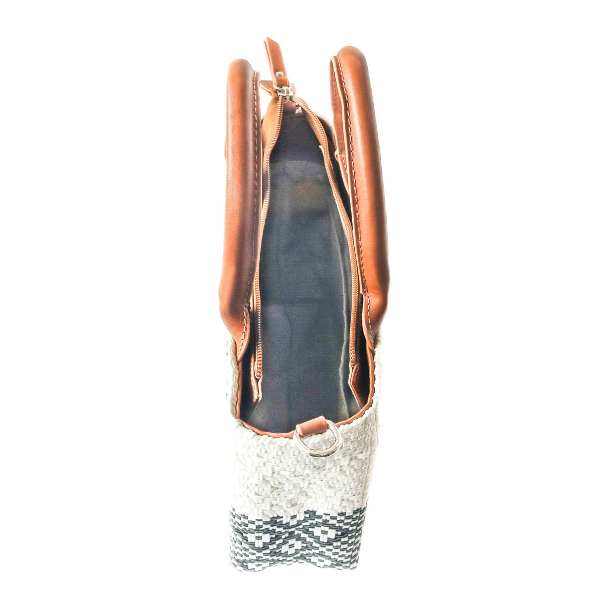 Small woven crossbody bag side view, tan leather trim and dark fabric lining inside