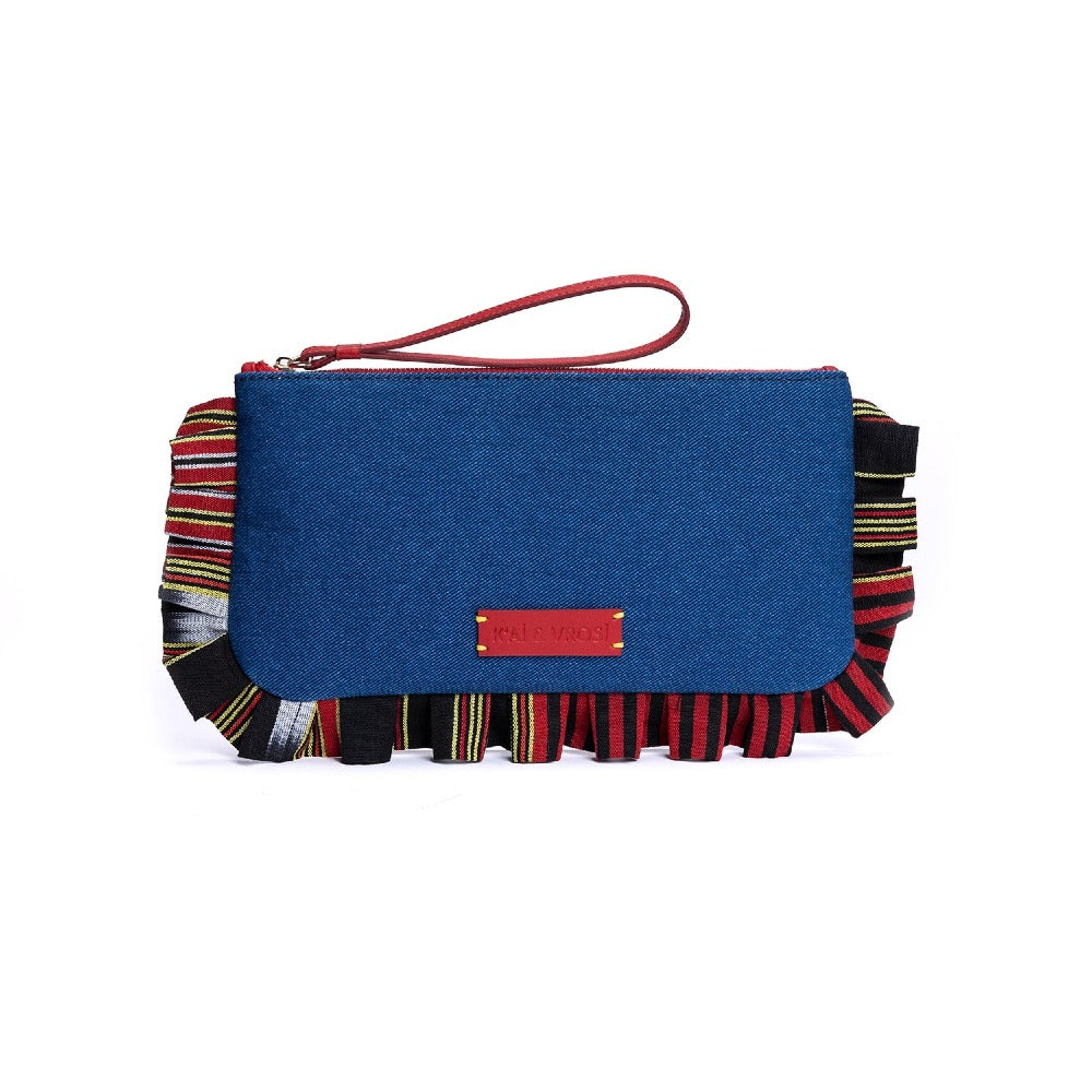 Denim clutch bag with blue front, red strap, flap closure, striped fabric trim