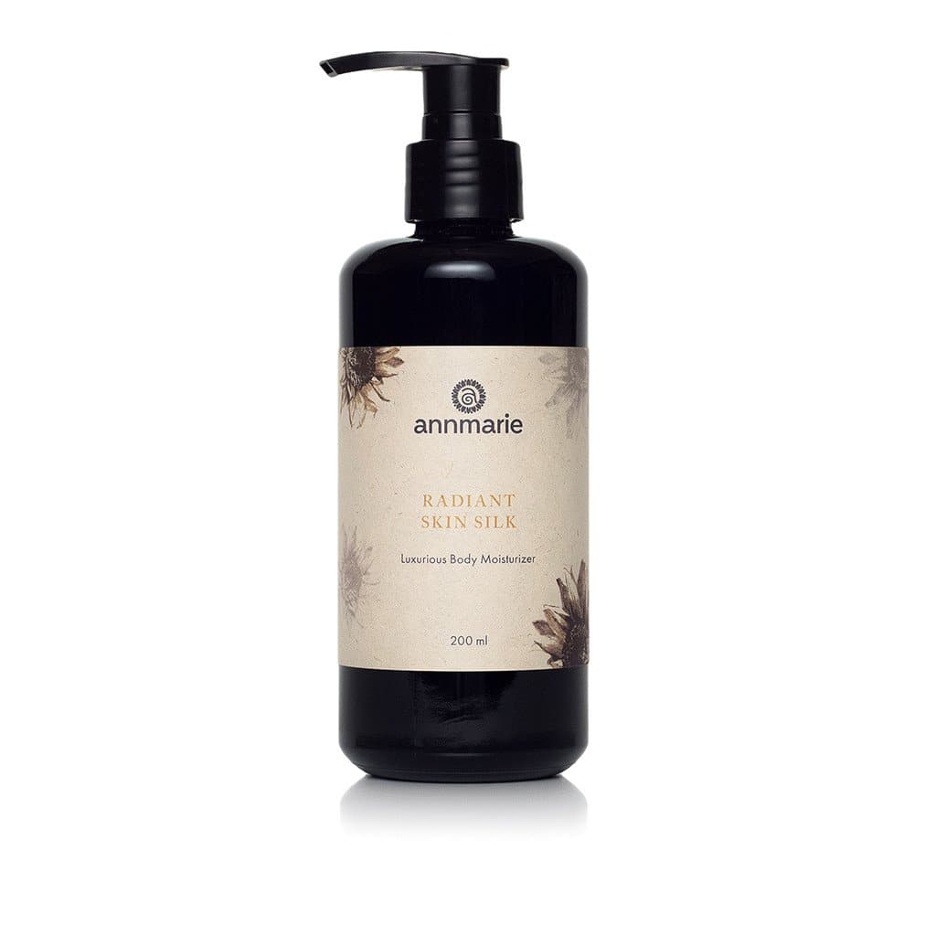 Radiant Skin Silk body lotion bottle with black pump, front view, 200 ml