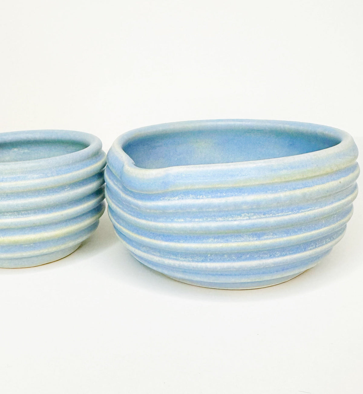 Blue ceramic matcha bowl set with ribbed sides, includes small bowl