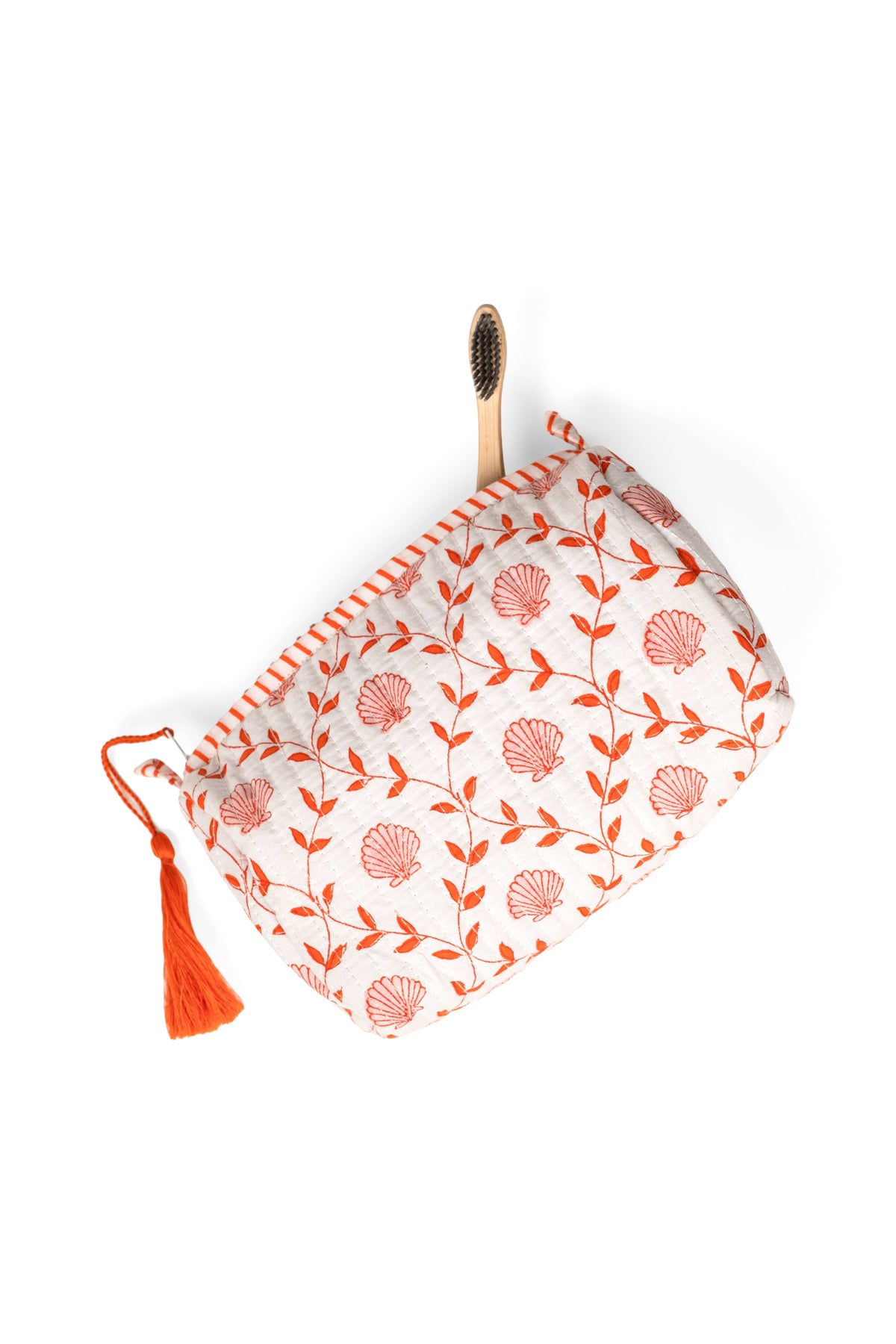 Blockprint makeup pouch, white with orange floral circles, zipper top and orange tassel