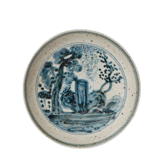 Blue and white porcelain round dish with cobalt illustrated landscape scene