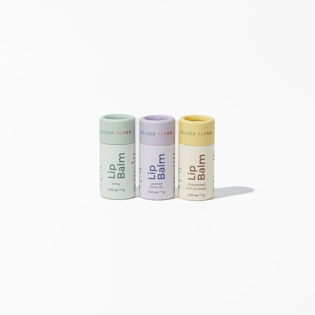 Oliver Flynn lip balm trio: mint, lavender, and yellow balm tubes