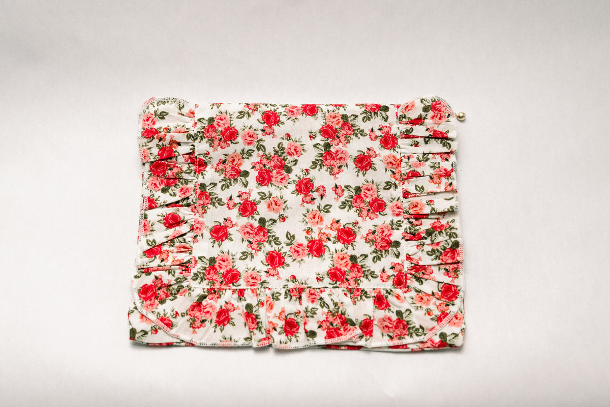 Floral ruffle zipper pouch, red rose print with gathered front and gold zipper pull