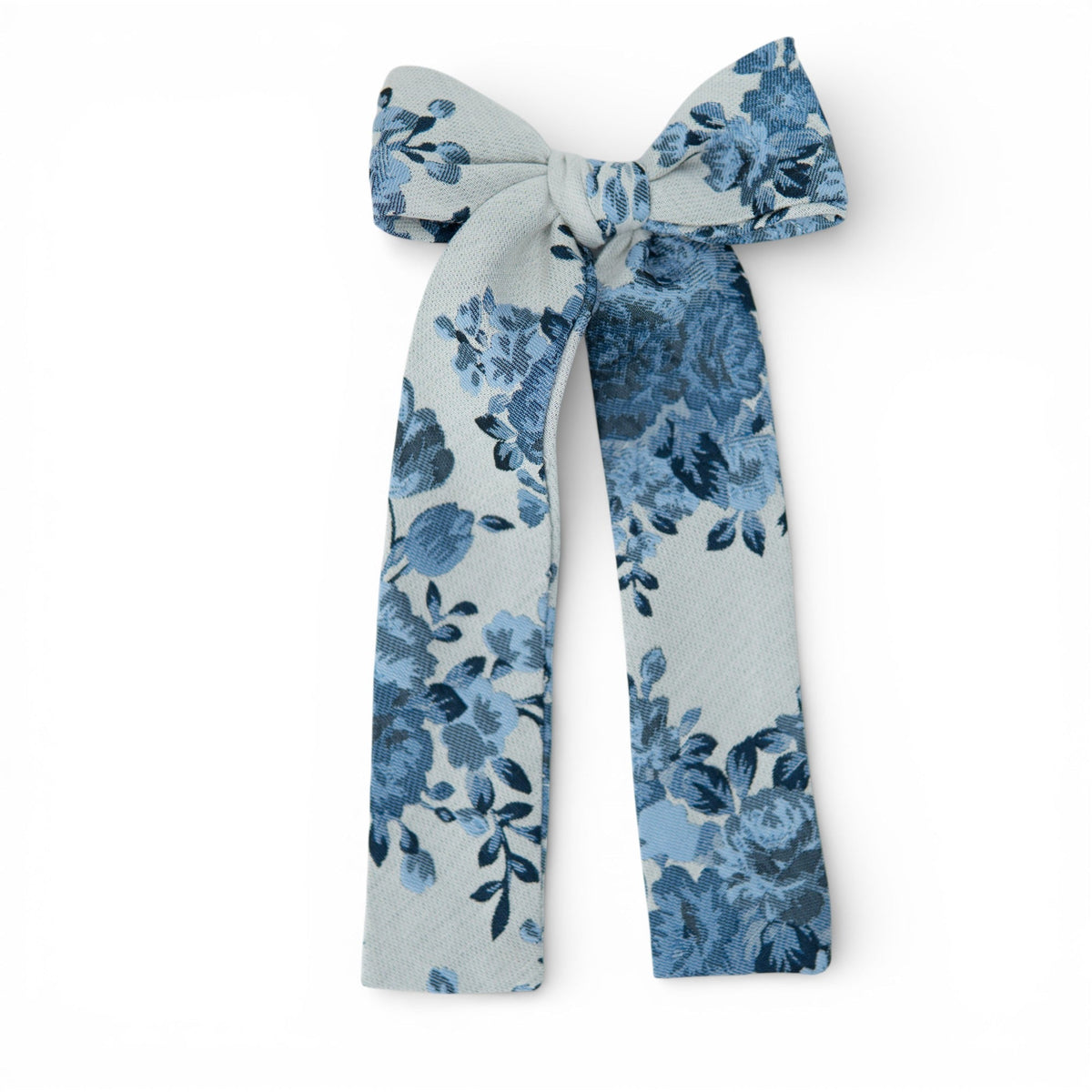 Light blue and navy floral lady hair bow with long tails, knot bow