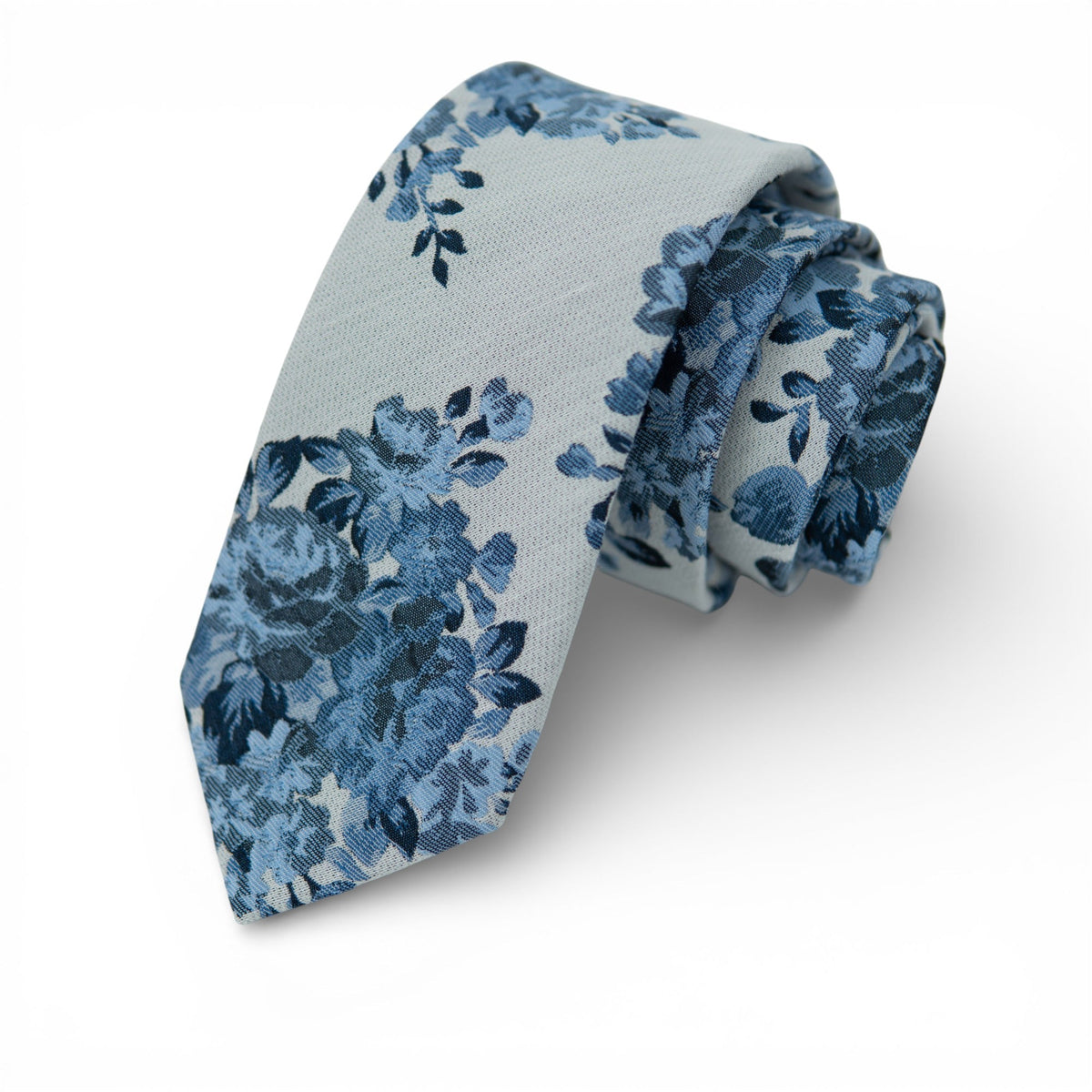 Men's light blue floral necktie with dark blue bouquet pattern and tied end