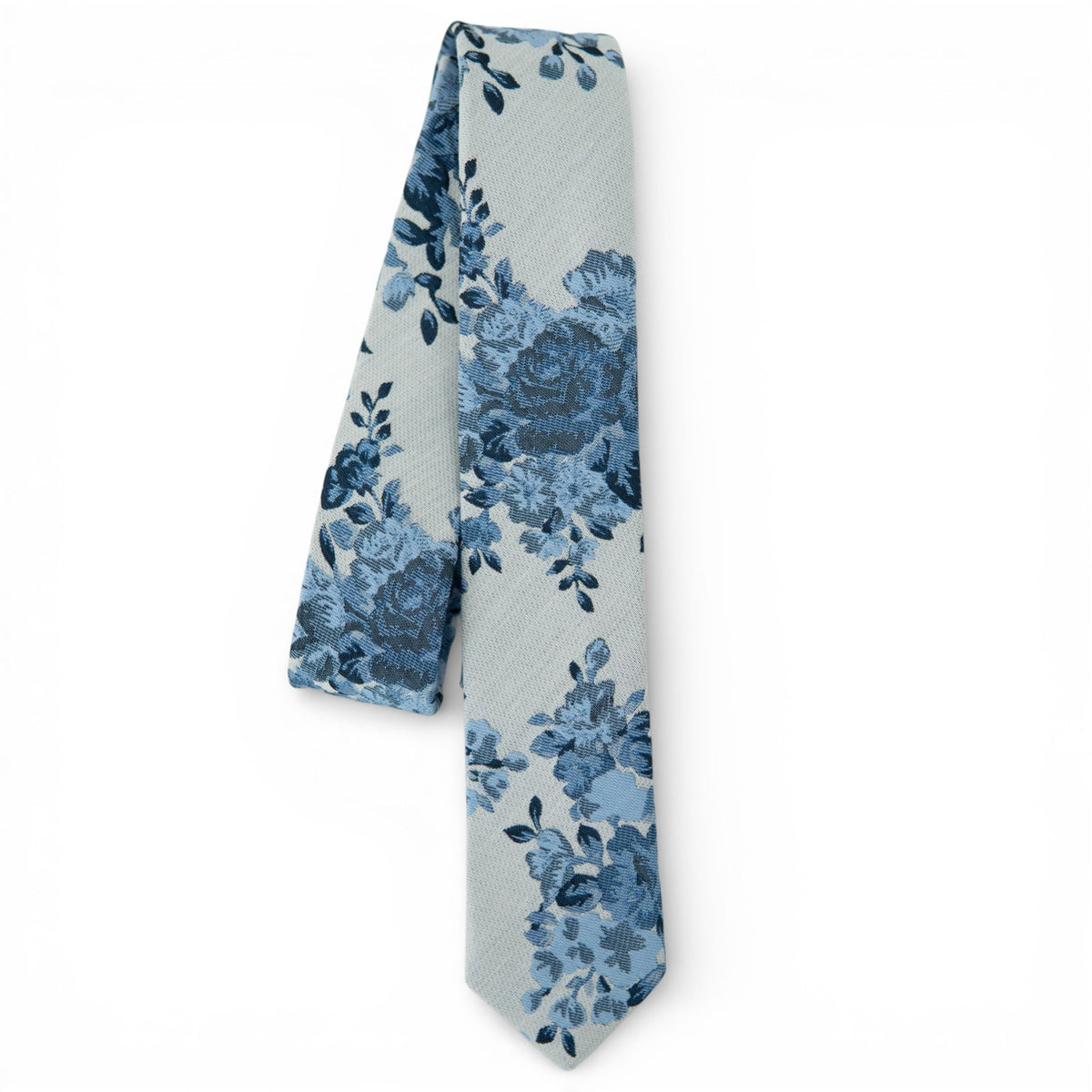 Youth floral tie in blue tones, textured weave with repeating blossoms