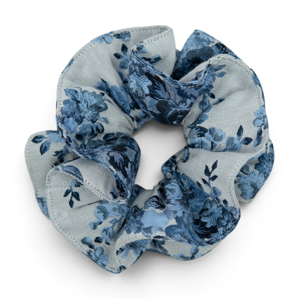 Light blue floral fabric hair scrunchie with gathered knot detail