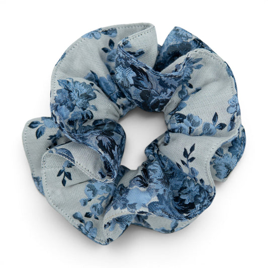 Light blue floral fabric hair scrunchie with gathered knot detail