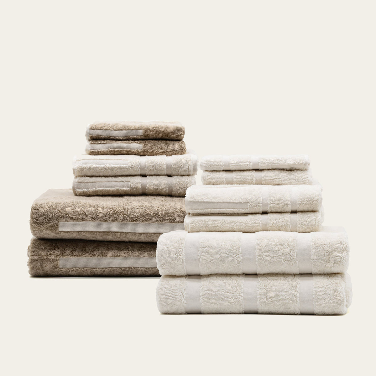 Australian cotton towels, stacked beige and white towels with striped border