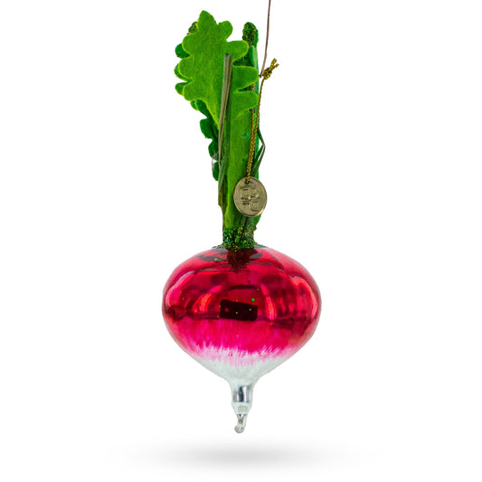 Red glass radish Christmas ornament with green leafy top and hanging loop