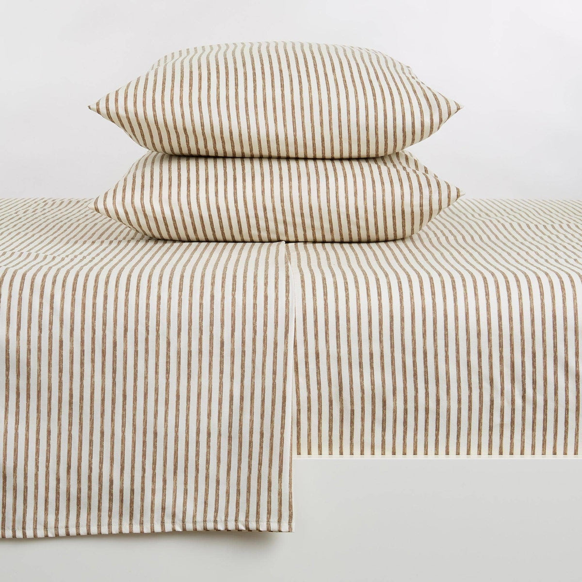 Taupe striped microfiber sheet set with stacked pillowcases and flat sheet