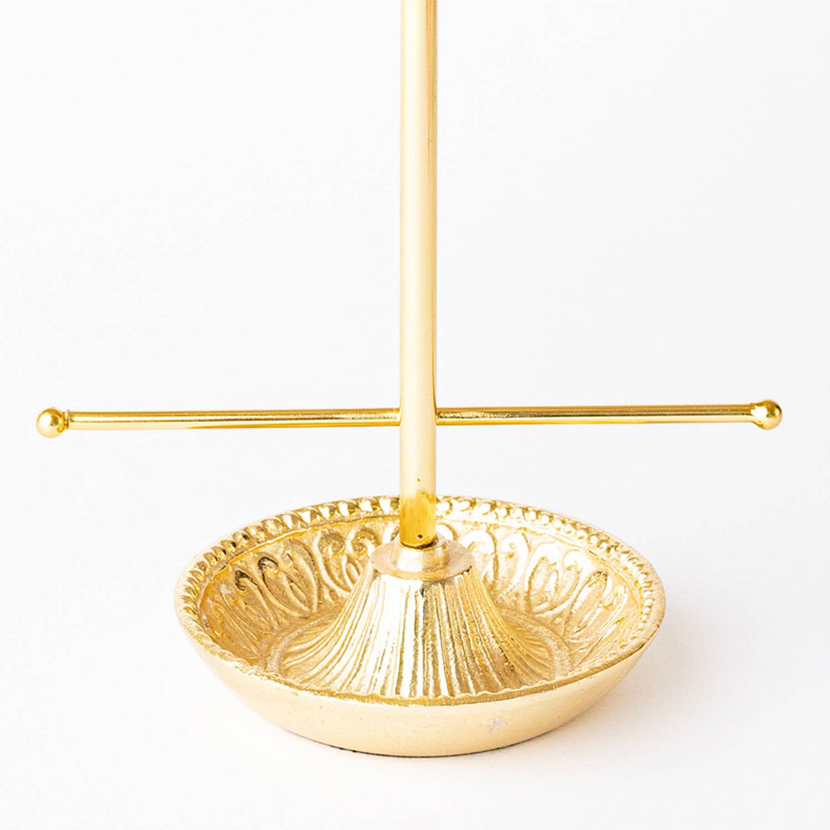 Gold-tone bow jewelry holder round base dish with vertical stem and bar