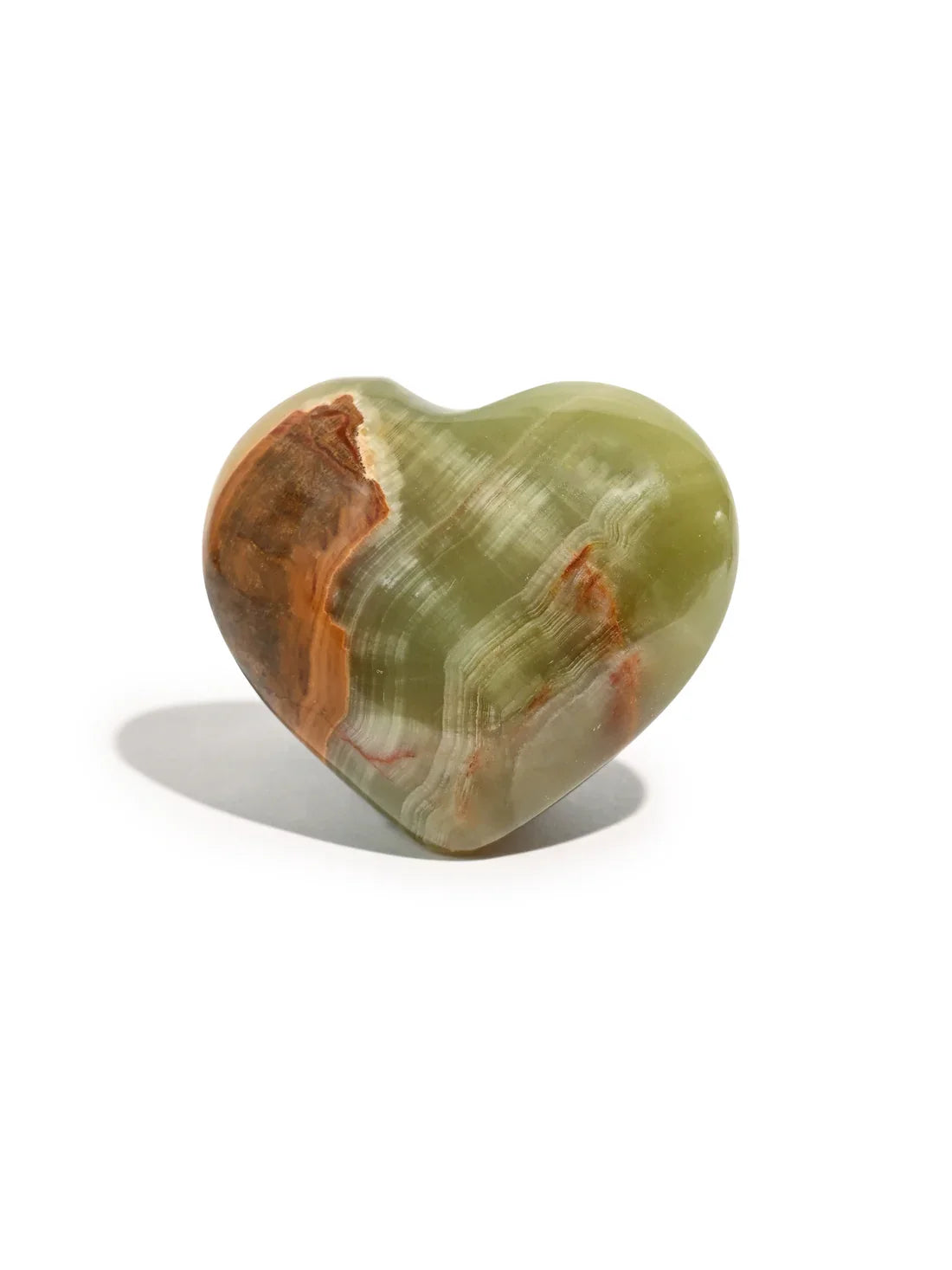 Heart-shaped natural stone, translucent green with orange-brown core and subtle red marks