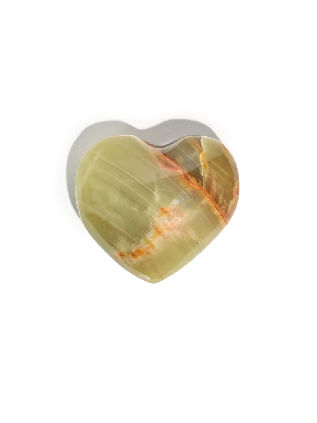 Heart-shaped stone, translucent pale green with orange-brown patch and faint red streaks