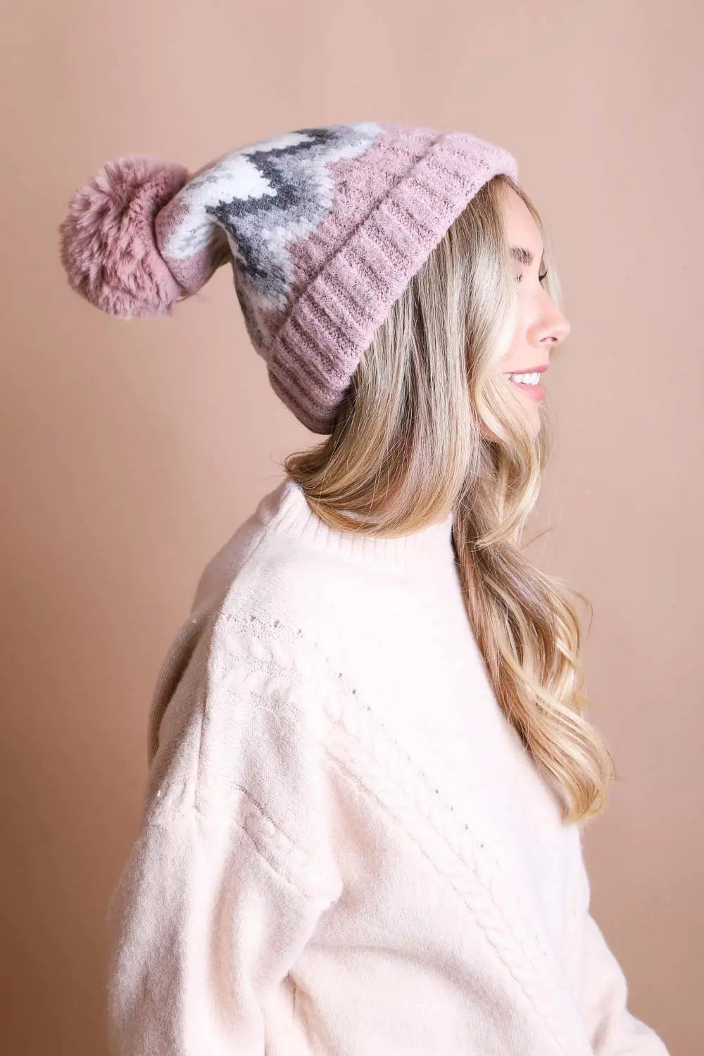 Lilac knit winter beanie with gray fair isle pattern and lilac pom-pom