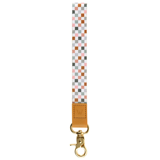 Check-pattern wrist lanyard with tan leather strap and gold clasp hook