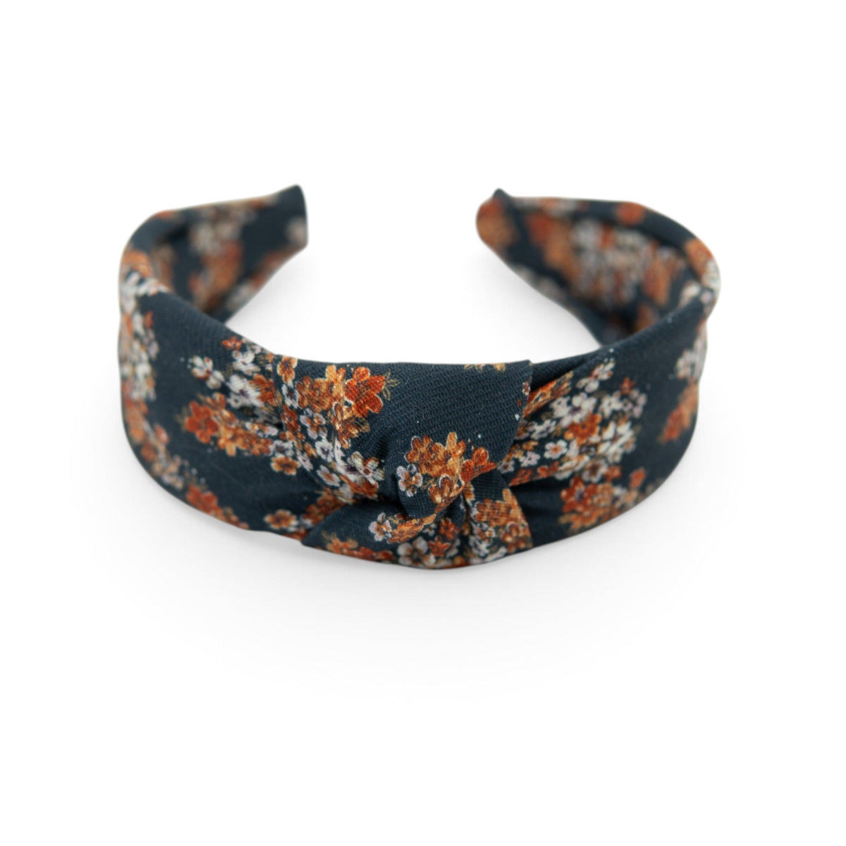 Knotted headband in dark navy with orange floral print, fabric bow-knot detail