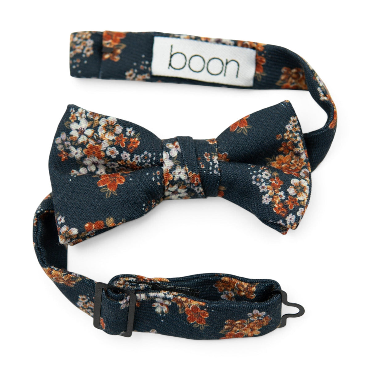 Boys bow tie with navy floral fabric and adjustable neck strap