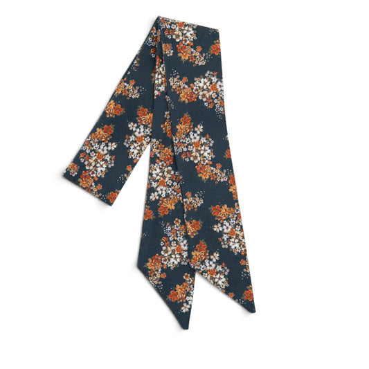 Floral hair sash with dark blue base, orange and white blossoms, angled ends