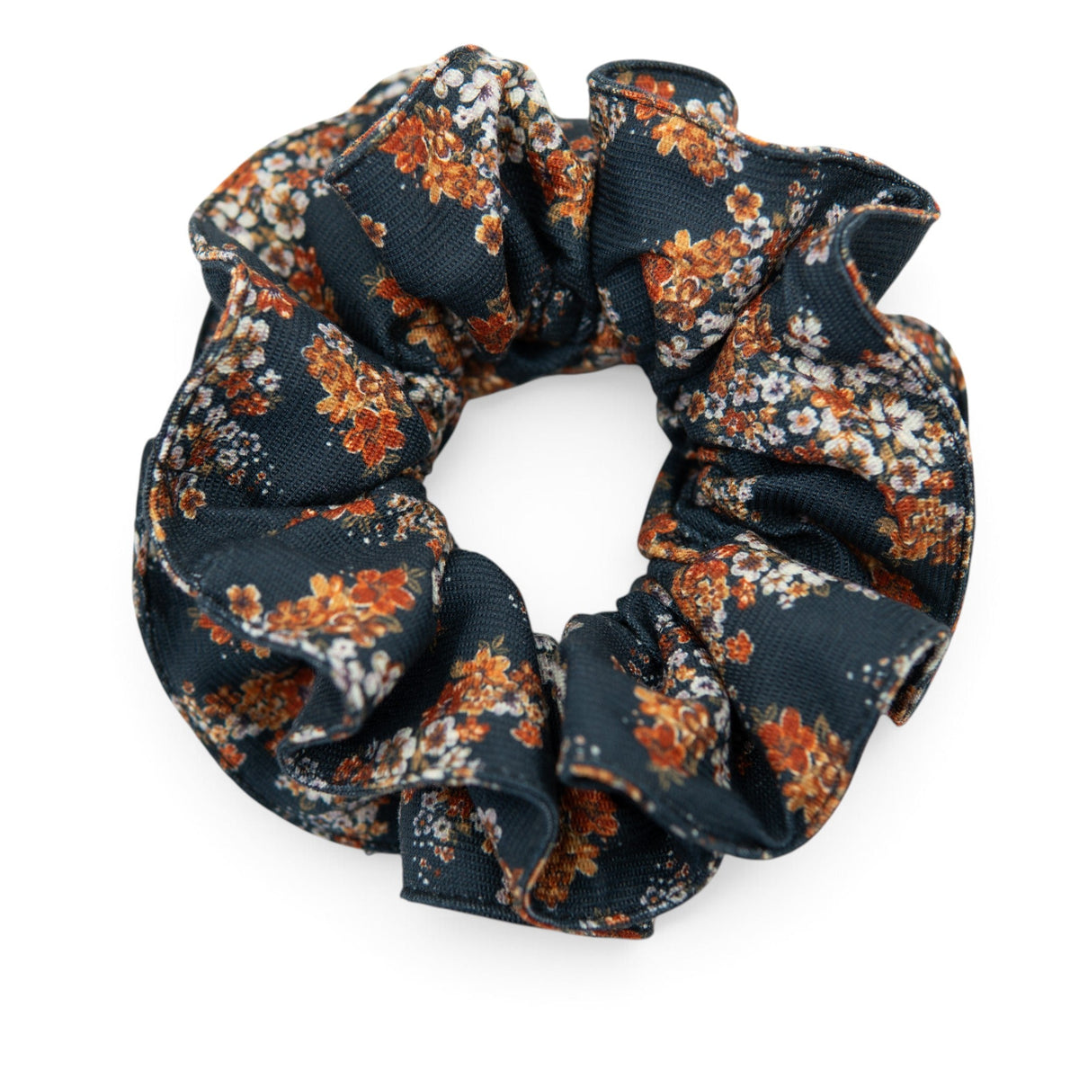 Floral hair scrunchie in dark navy with orange and cream flower print
