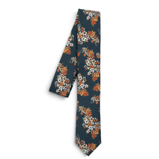 Youth tie with dark blue base and orange floral pattern