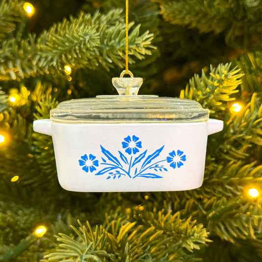 Mini ceramic casserole ornament with blue cornflower pattern and clear lid, gold hanging cord