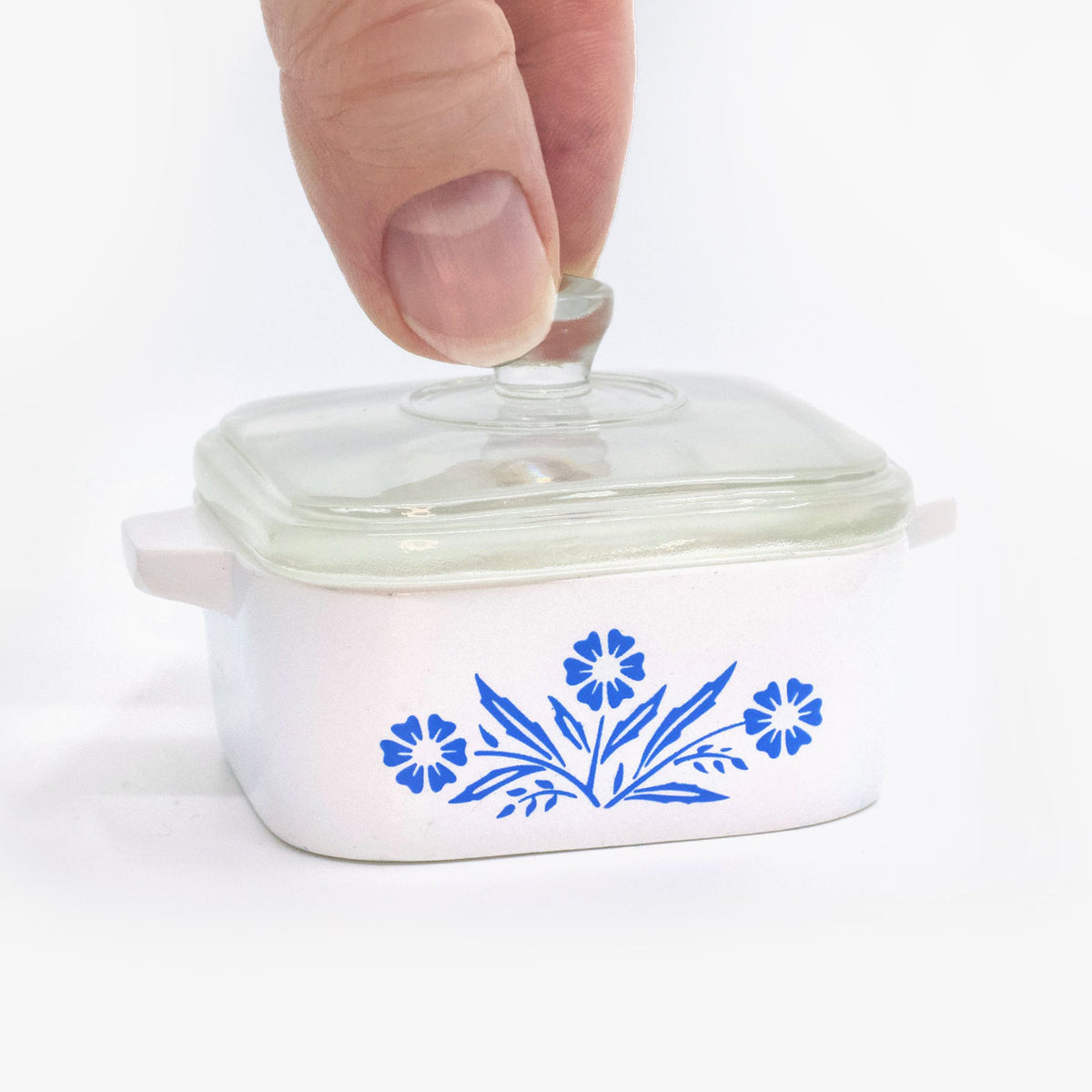 Mini trinket box with clear glass knob lid and blue cornflower floral design